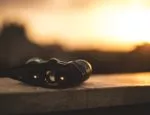 A pair of binoculars on a ledge.